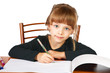 The little girl draws in an album felt-tip pens