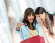 Excited shopping women