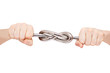 Hard knot of iron rod in male hands