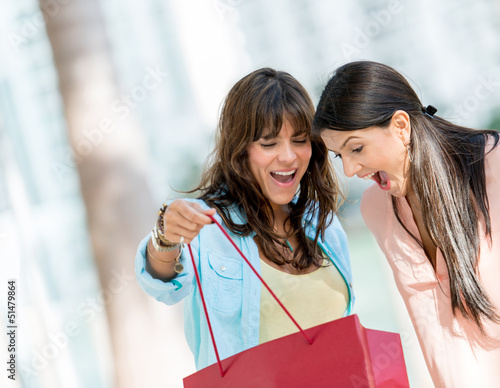Photo: Excited shopping women Excited shopping women