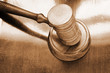 Judge's gavel on wooden background