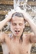 Portrait of a young man in the water