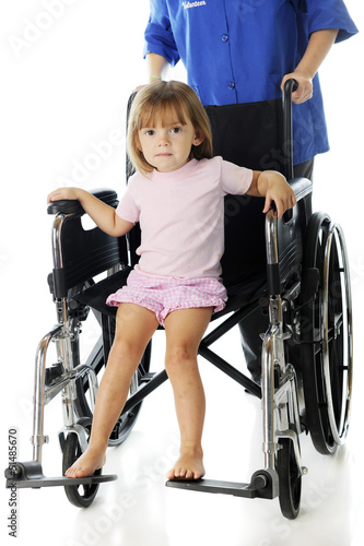 Photo: Tiny Hospital Patient in a Discharge Wheelchair Tiny Hospital Patient in a Discharge Wheelchair