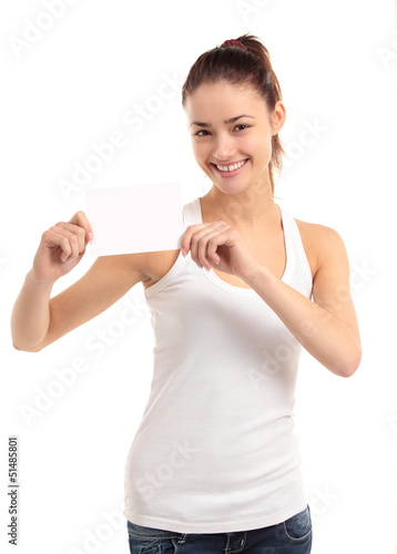 Photo: Woman showing empty blank paper sign board Woman showing empty blank paper sign board