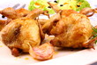 Fried quail with gravy, garlic, rosemary and salat
