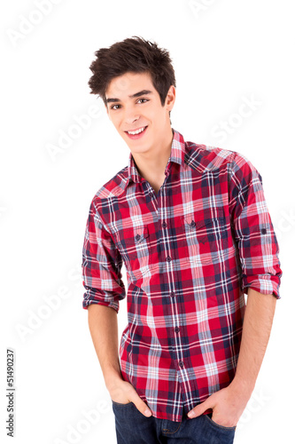 Photo: Young casual man posing isolated over white Young casual man posing isolated over white