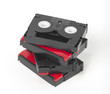 4 stacked mini dvc tapes. clipping path to isolate
