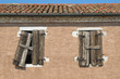 Old windows in an abandoned rural house