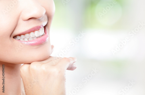 Photo: Beautiful young woman teeth close up Beautiful young woman teeth close up