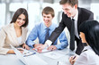 Foto: Business people working at meeting Business people working at meeting