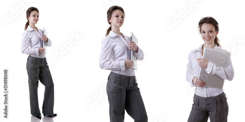 Photo: Beautiful businesswoman in suite isolated on white Beautiful businesswoman in suite isolated on white