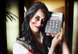 Female devil business woman showing profits