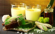 Hand made soap and candles on bamboo mat background