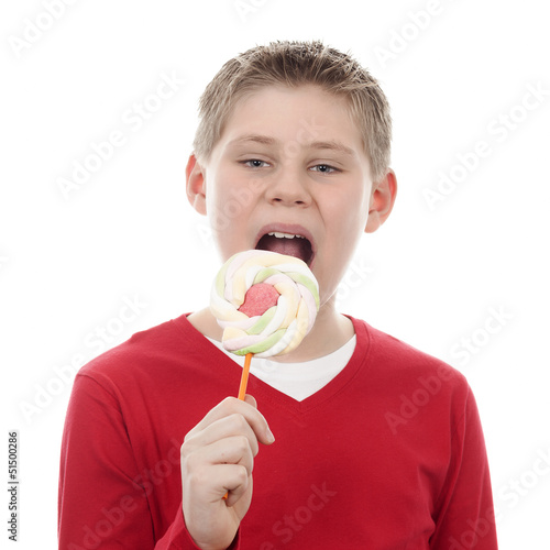 Photo: boy eating big lollipop boy eating big lollipop