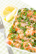 Salmon carpaccio - fresh salmon slices in marinade