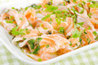 Salmon carpaccio - fresh salmon slices in marinade