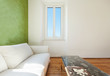 home interior, view of the living room, white divan