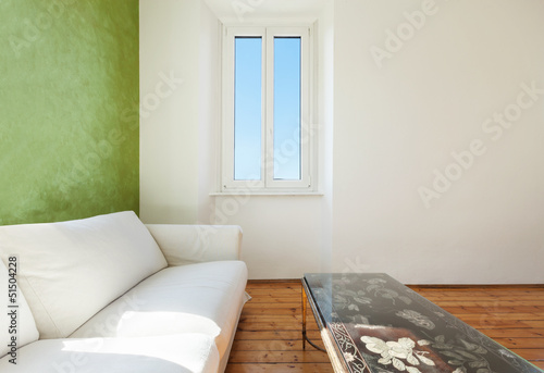 Photo: home interior, view of the living room, white divan home interior, view of the living room, white divan