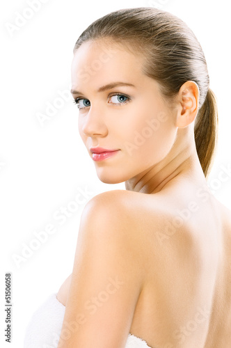Photo: Young beauty with towel, studio shot isolated on white Young beauty with towel, studio shot isolated on white