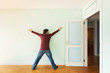 portrait of a weird guy in the room with the door open