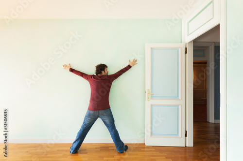 Photo: portrait of a weird guy in the room with the door open portrait of a weird guy in the room with the door open