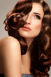 Photo: Hair. Beautiful Woman with Long Hair. Curly hairstyle Hair. Beautiful Woman with Long Hair. Curly hairstyle