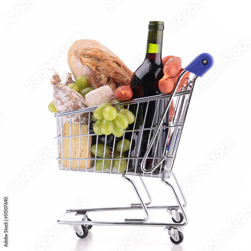 Photo: shopping cart with groceries shopping cart with groceries