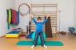 Child is therapeutic exercises in the gym