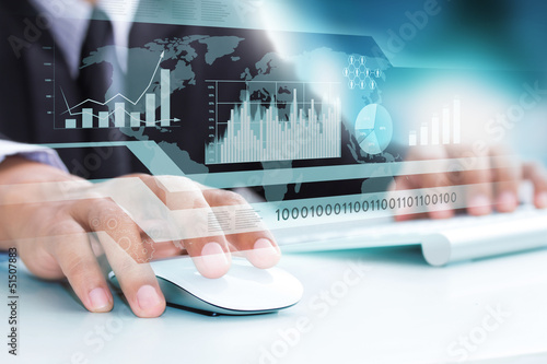 Photo: human hand and computer keyboard as symbol of high technology human hand and computer keyboard as symbol of high technology