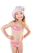 Cute smiling little girl in swimsuit and cap isolated