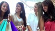 Shopping women on escalators