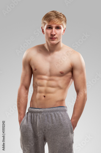 Photo: Handsome guy posing with naked torso Handsome guy posing with naked torso