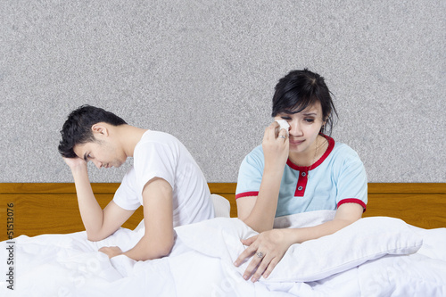 Photo: Crying girlfriend after fight in bed Crying girlfriend after fight in bed