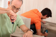 Photo: duo of diy : grandfather and grandson duo of diy : grandfather and grandson
