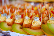 Tartlets with cream, cheese and melons