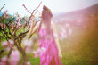 Foto: Woman in spring garden Woman in spring garden