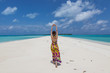 Young beautiful women on the sunny tropical beach