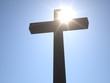 Christian Cross in front of Sun