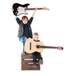 two boys with guitars on a box