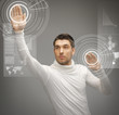 man working with virtual screens