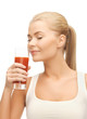 young woman drinking tomato juice