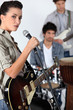 A band jamming together