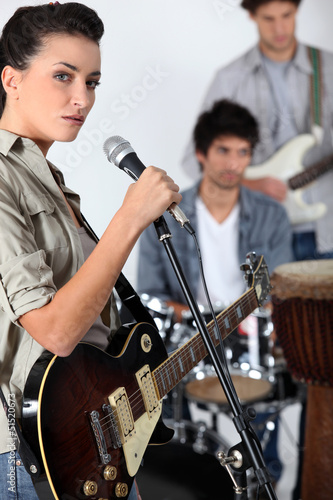 Photo: A band jamming together A band jamming together
