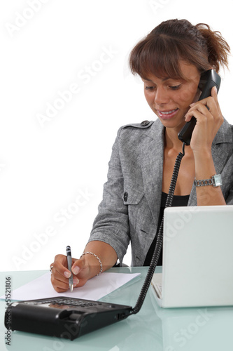 Photo: Secretary busy at work Secretary busy at work