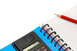 Notebook and calculator isolated on white background