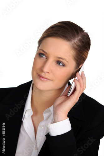 Photo: young woman on the phone young woman on the phone