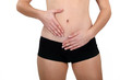 Female hands touching belly