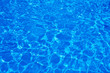 Hotel swimming pool with sunny reflections