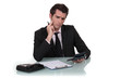 Confused man holding calculator