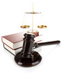 Golden scales of justice, gavel and books isolated on white